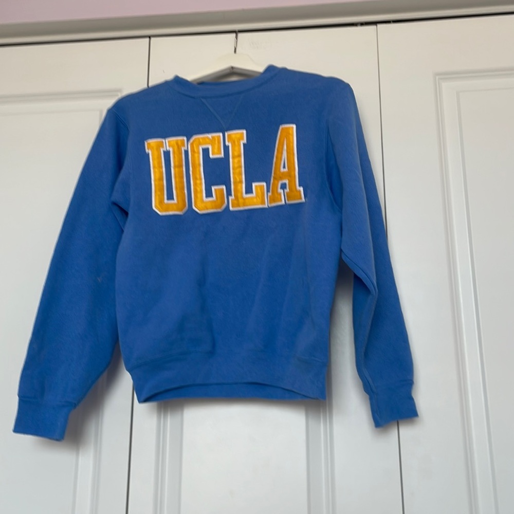 UCLA store blue sweatshirt with yellow lettering